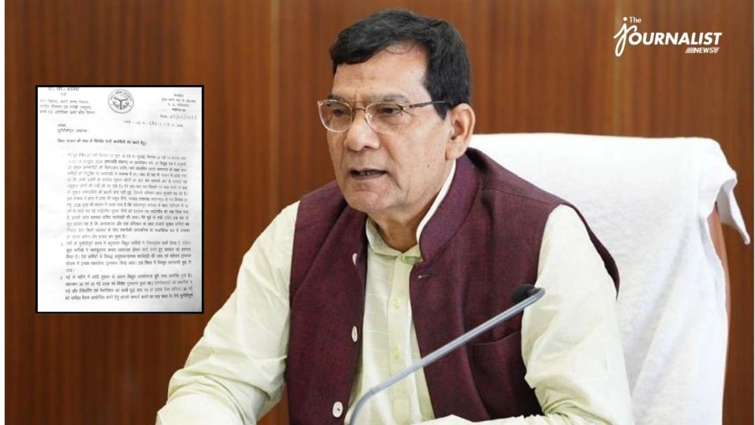 Man in a beige shirt and maroon vest, wearing glasses, sits at a desk with a microphone; a document inset appears on the left.