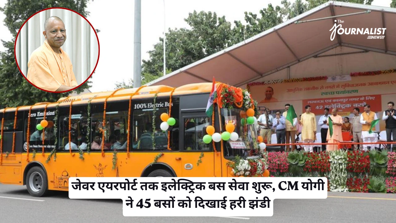 Ceremonial launch of 100% electric bus service with a decorated orange bus, stage, crowd, Indian flags, and a circular inset portrait of a man in saffron robes.