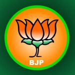 BJP political symbol: orange lotus inside a green-bordered circle with 'BJP' text.