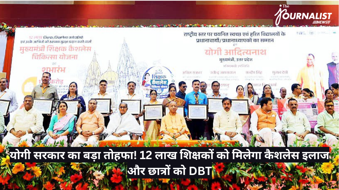 Group of officials and awardees on stage holding certificates at a ceremony, with a floral backdrop and banner in the background.